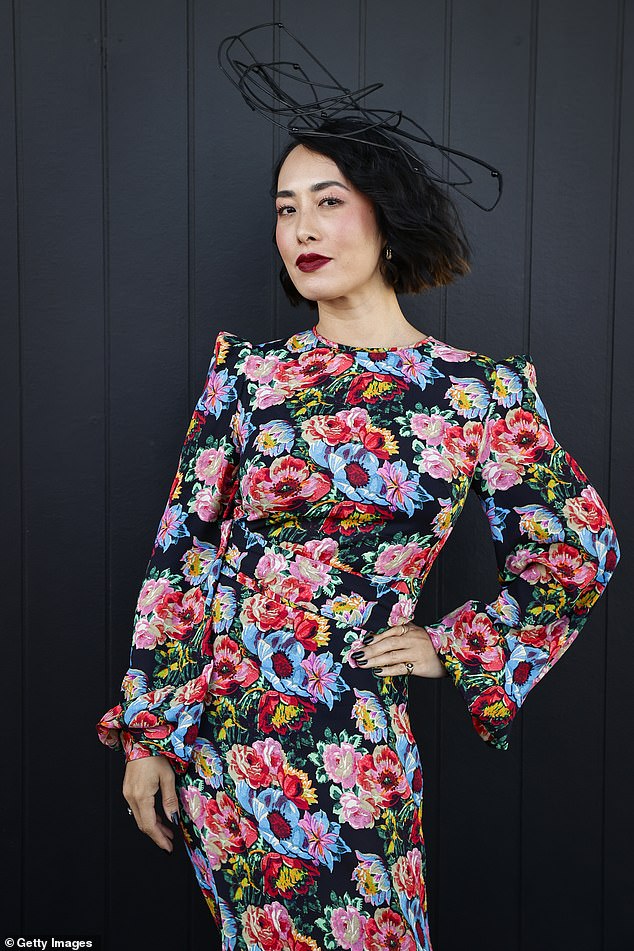 The former MasterChef Australia judge, 41, sent temperatures soaring in a designer floral dress that showed off her stunning figure