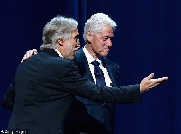 Portnow is seen with Bill Clinton at a Radio City Music Hall event in January 2018