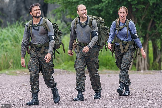 Strong: The former WAG showed what she's made of on Sunday night as she reached the final of the grueling show with Gareth Gates (left) and Matt Hancock (centre)