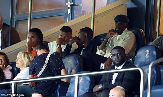 The France captain (center, white t-shirt) was briefly eliminated by the Ligue 1 champions at the start of the season for refusing to sign a new contract, but was invited back into the group