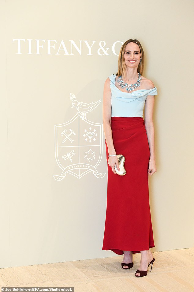 Flawless: Also in attendance was socialite and magazine editor Lauren Santo Domingo, who slipped into a stunning light blue satin top and a red midi skirt