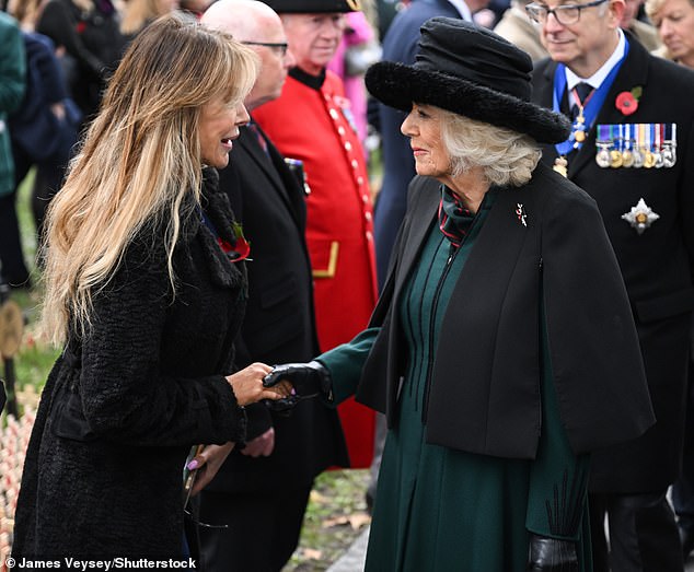 An honor: Following royal protocol, Lizzie bowed as she greeted the Queen and gently shook her hand during the unlikely meeting