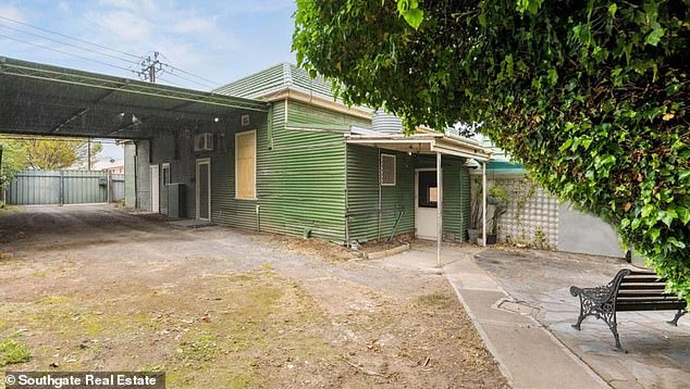 The 1900s house (pictured) also comes with several outbuildings and aviaries