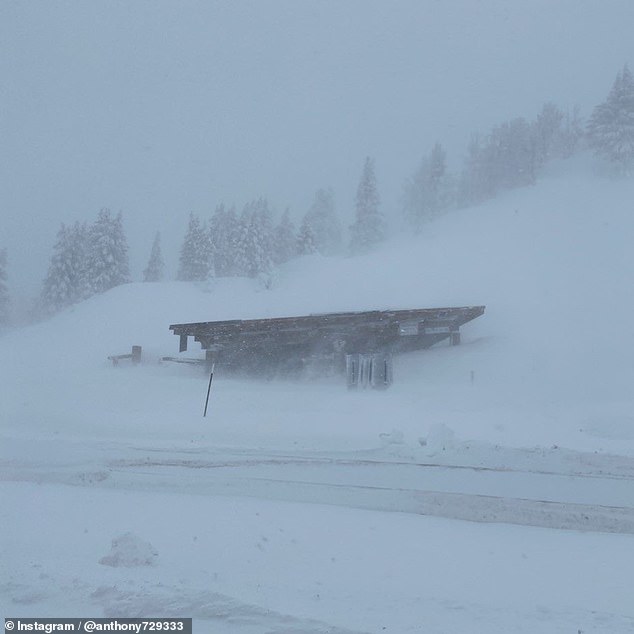 Last winter's atmospheric rivers resulted in extreme snowfall and led to highway closures due to the whiteout conditions seen here at this rest stop in the Sierra Nevadas