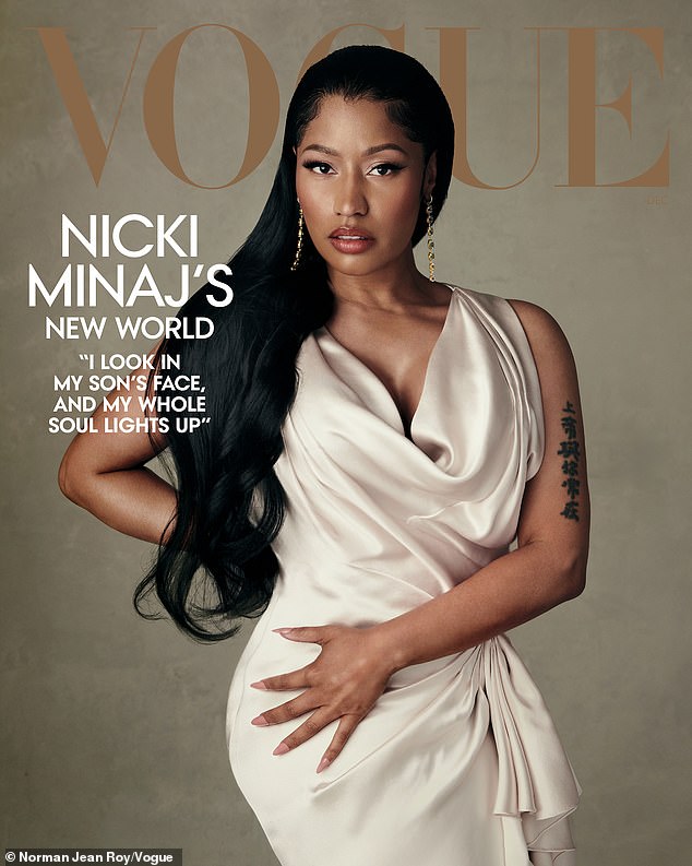 Star: Nicki, 40, posed with her three-year-old, who she revealed she nicknamed 'Papa Bear' during the shoot