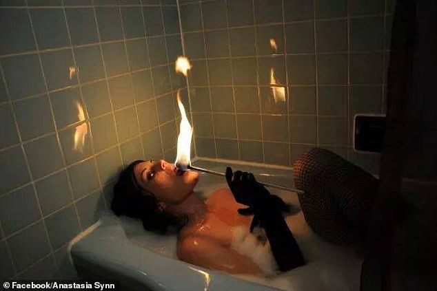 Anastasia Sen, magician, stunt performer and bio-hacker, performs a terrifying act of eating fire while in the bathroom