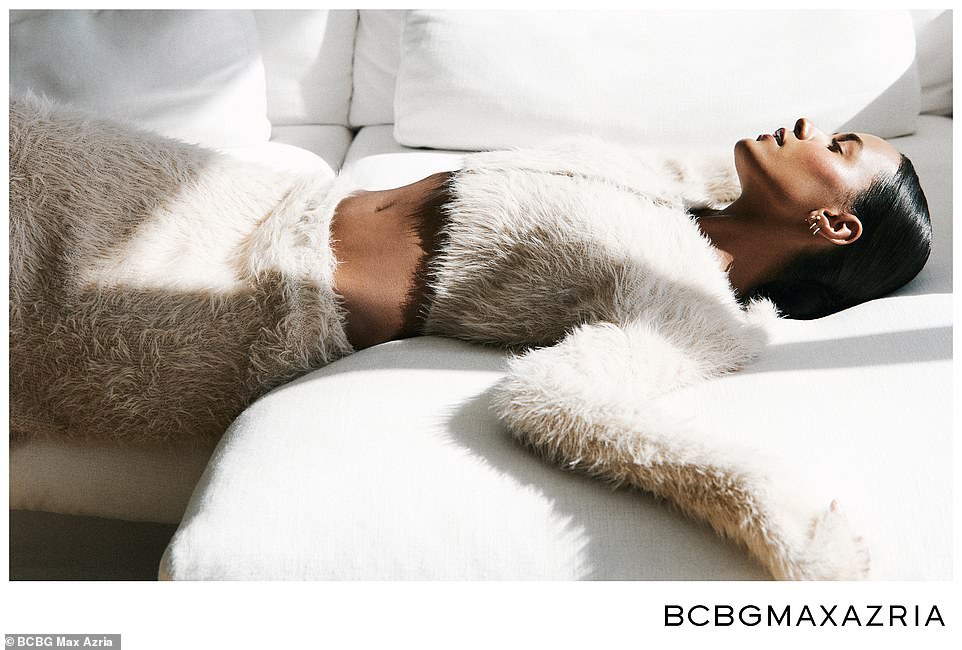 Chilled out: This week she debuted as the new face of the BCBG Holiday collection in images shared exclusively with DailyMail.com.  The runway siren was seen in a cream crop top and matching skirt that made the most of her tiny waist and toned abs