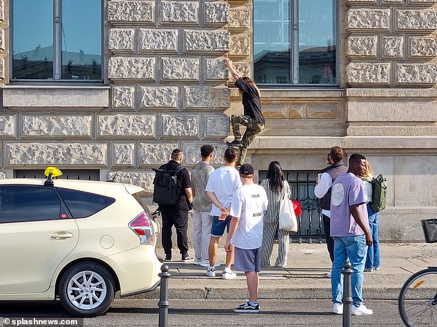 In June, the 51-year-old was also spotted climbing the wall of a hotel in Germany without a harness