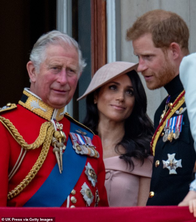 Pictured on the balcony after Trooping the Color in 2018. Charles and youngest son Harry had been close