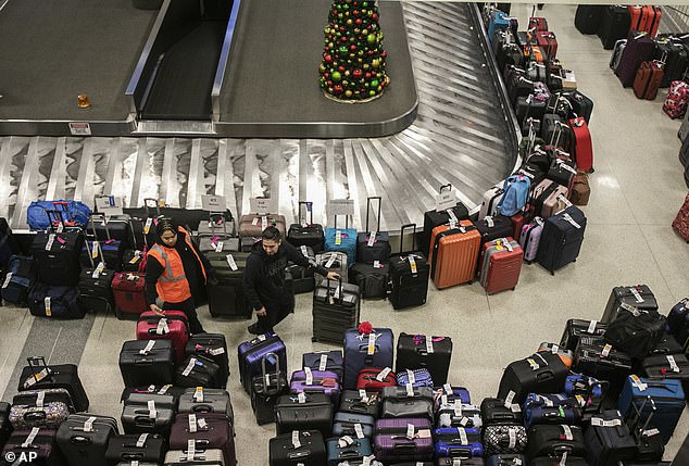 Large piles of lost luggage were left at baggage carousels after Southwest Airlines canceled thousands of flights last December