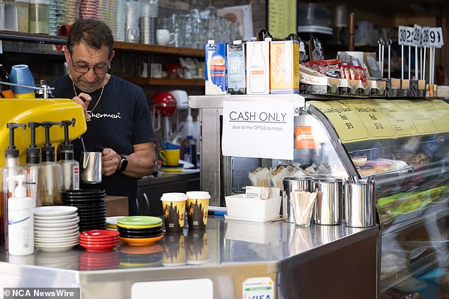 About 400,000 businesses were affected by the Optus outage, including this Adelaide coffee shop, which could only do cash transactions