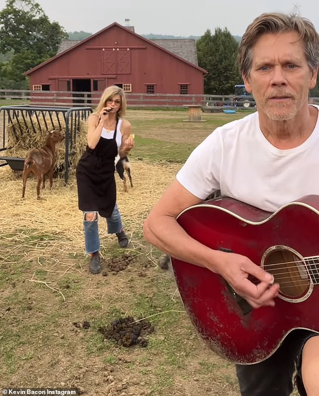 Farm fun: Here you see the actor playing guitar on his farm with Kyra in the background