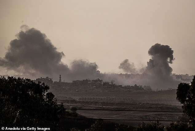 Smoke rises from the town of Sderot after Israeli airstrikes on Thursday, November 9