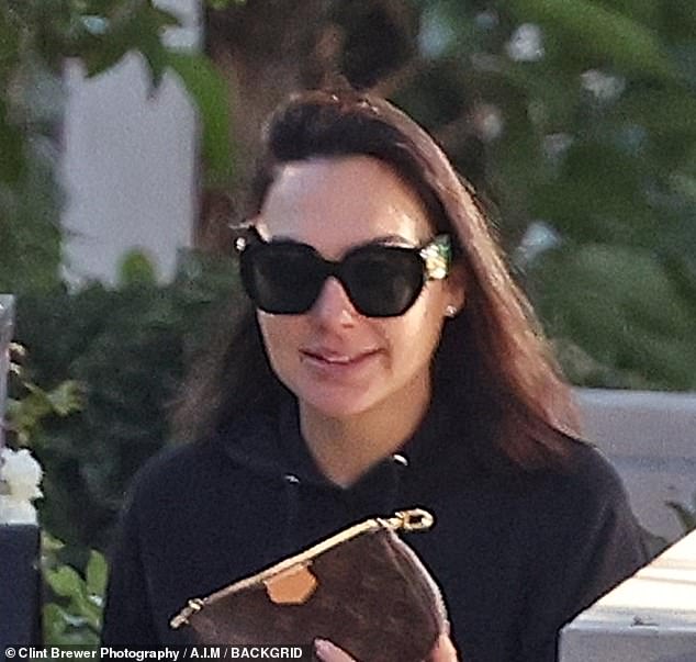 Outing: The actress, 38, was spotted running errands in LA with her young daughters on Thursday, hours after pro-Israel and pro-Palestinian protesters clashed outside the museum