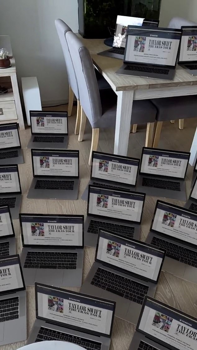 The extraordinary video shows a close-up of a laptop open to the ticket portal, then the camera zooms out to reveal countless laptops and smartphones covering the floor of an entire apartment