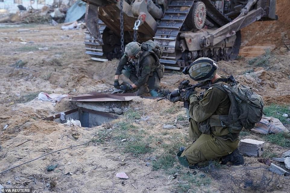 Meanwhile, an IDF unit claimed to have discovered a Hamas weapons factory next to a child's bedroom in the city's Sheikh Radwan neighborhood.  Images shared on the IDF's official social media accounts showed heavily armed Israeli troops standing in a room with several small beds and pink wallpaper covered in rubble.  Drone parts and missiles were seen in an adjacent room as soldiers combed the site.