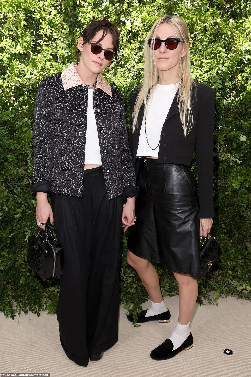 Looking great: Kristen's fiancée Dylan Meyer was also in attendance, wearing a black leather knee-length skirt with a white blouse, a cropped jacket and a Chanel bag