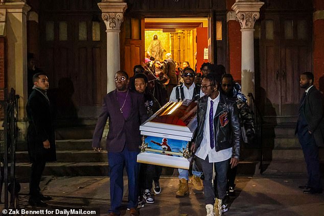 Pallbearers pictured with the casket of the seven-year-old from Brown Memorial Baptist Church in Brooklyn, New York