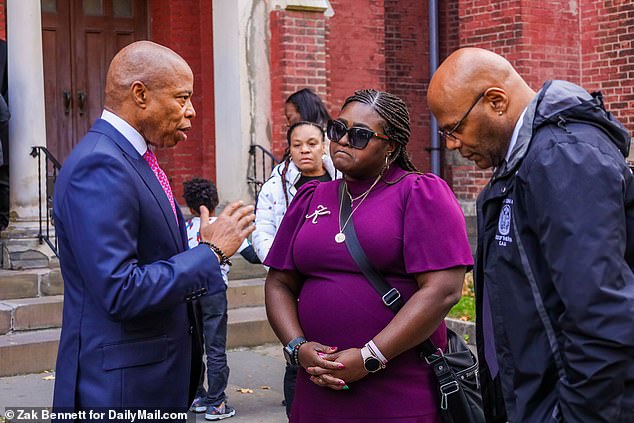 Taqunda Hughes speaks off-duty with New York City Mayor Eric Adams after comforting mother in the hours after she lost her son last month