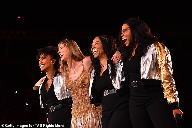 The Bad Blood hitmaker laughs with her backing vocalists during their opening night in Buenos Aires