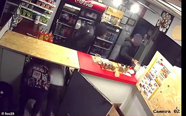 Armed with weapons, the hooligans were caught on CCTV entering the Bally's Pizza pizzeria at 12.26pm on October 9 as an employee was closing the business.