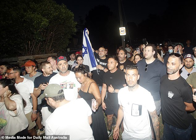 During Friday night's protest, pro-Palestinian supporters and pro-Israel crowds lined either side of Hawthorn Road and shouted abuse at each other.