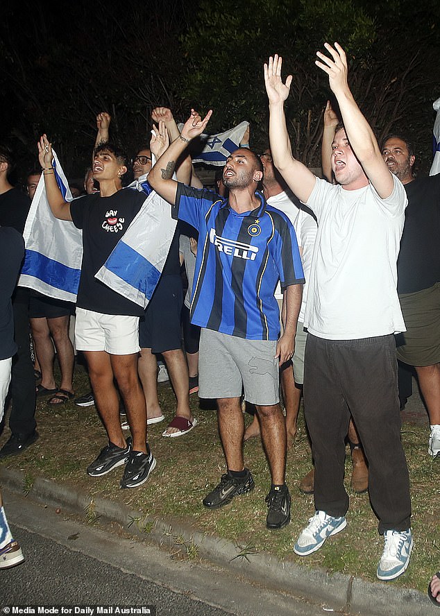 Supporters of Israel lined one side of the street as both groups insulted each other