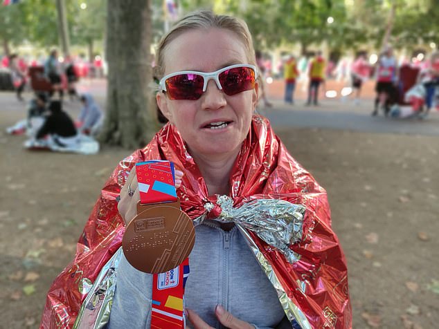 Kelly introduced herself with a London Marathon medal, with #WeRunTogether in both text and braille