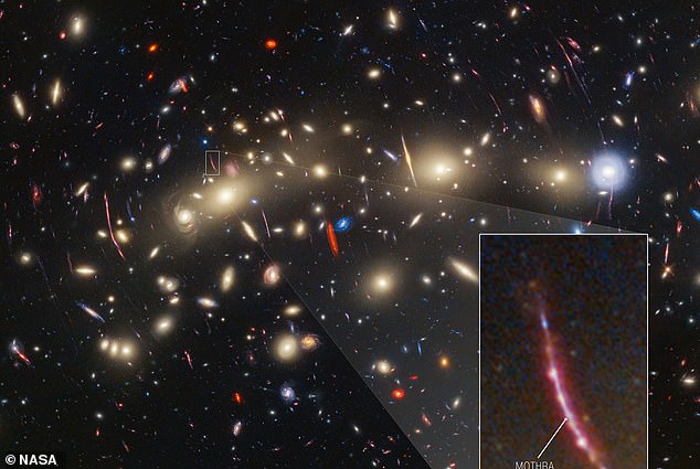 Behemoth: Within one of the galaxies is a monster star called 'Mothra' (bottom right), which can be seen as it was when the 13.7 billion year old universe was only 3 billion years old