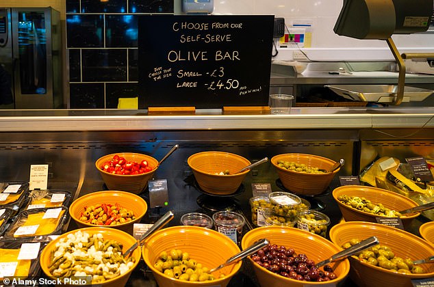 Olive self-service bar at Booths supermarket in Ripon, North Yorkshire