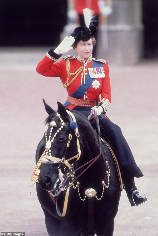 Queen Elizabeth II takes the salute during the Trooping the Color ceremony in London in 1983