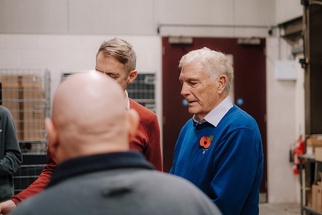 West Ham legend Sir Trevor Brooking was among those to learn about the craftsmanship of the Remembrance Sunday wreaths