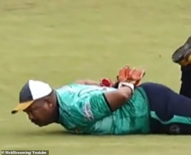 He had to lie very still with the ball still on his back so that a fielder could pluck it off and claim the dismissal