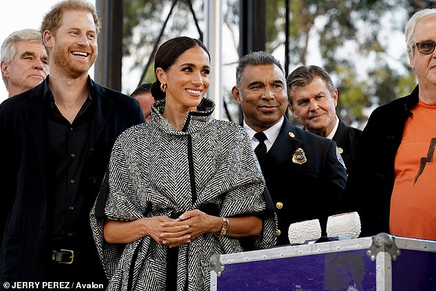 It's understood there's 'barely any level of communication' between Charles and Harry at the moment (pictured with Meghan at Kevin Costner's estate in Montecito, US, on September 22)