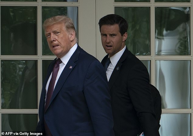 Trump is seen with McEntee outside the Oval Office of the White House on September 11, 2020