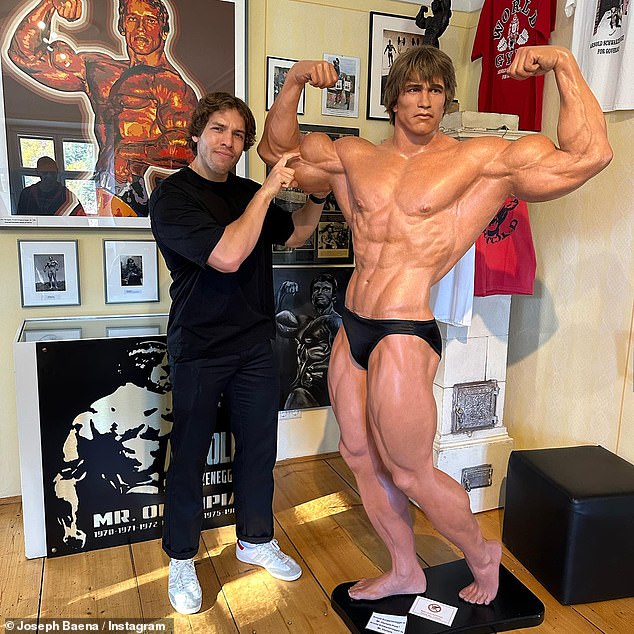 A striking pose: Earlier this month, the aspiring actor uploaded a photo of himself happily posing next to a wax figure of his father at the star's museum in Thal, Austria