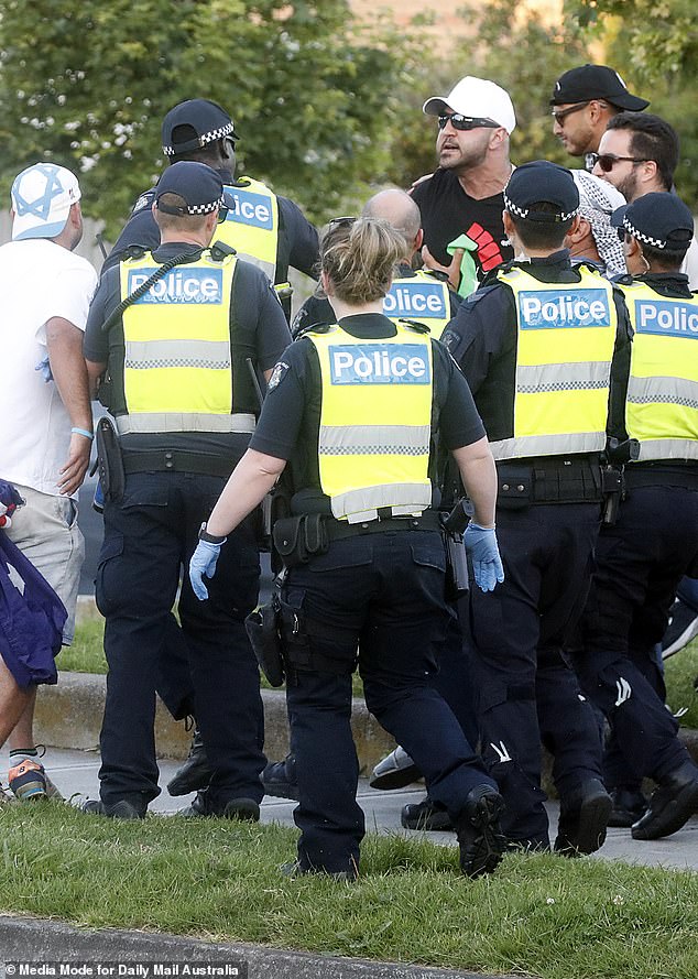 Police tried to keep the peace but were met with resistance from young men who tried to storm the line