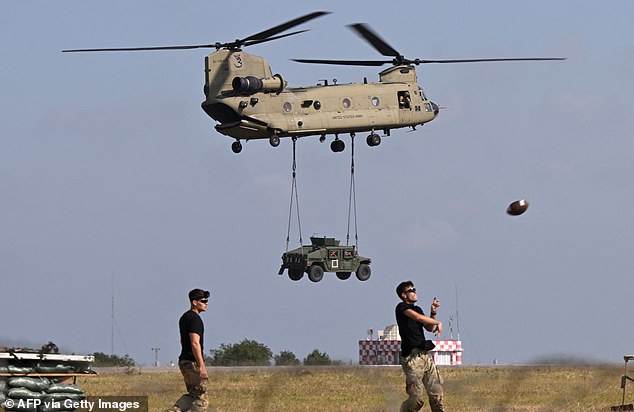 A file photo shows a U.S. Army Boeing CH-47F Chinook tandem rotor helicopter.  Boeing is the third largest defense contractor in the world