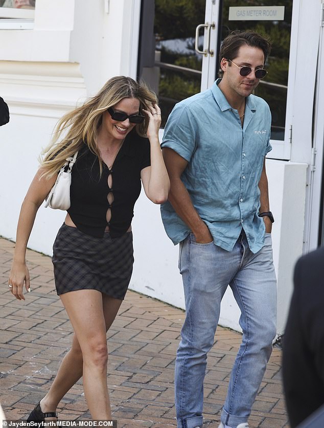 The Australian actress was on a date with husband Tom Ackerley (right) at Mimi's in the beachside suburb of Coogee when she ordered a round of drinks.