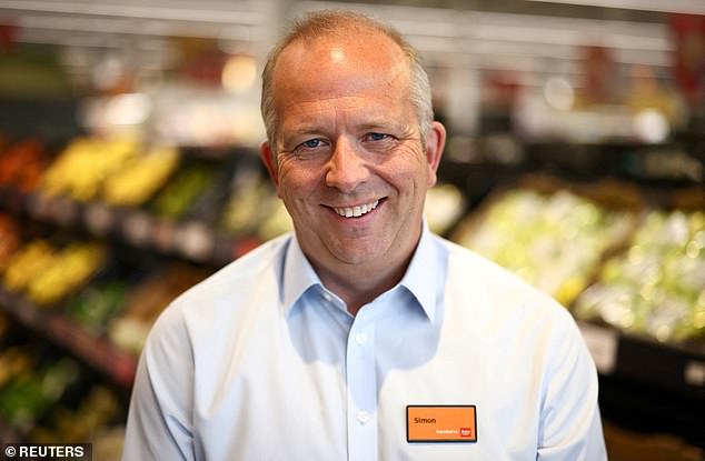 Speaking: Sainsbury's boss Simon Roberts said the supermarket spends almost £500m a year on business rates