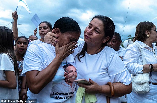 Marulanda (left) led a number of community demonstrations calling for her husband's release