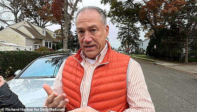 Standing outside the family home in Massapequa Park on Friday, Ellerup's lawyer Robert Macedonia (pictured) confirmed the visit to DailyMail.com and said she would attend her husband's trial to see if he is guilty of the crimes.