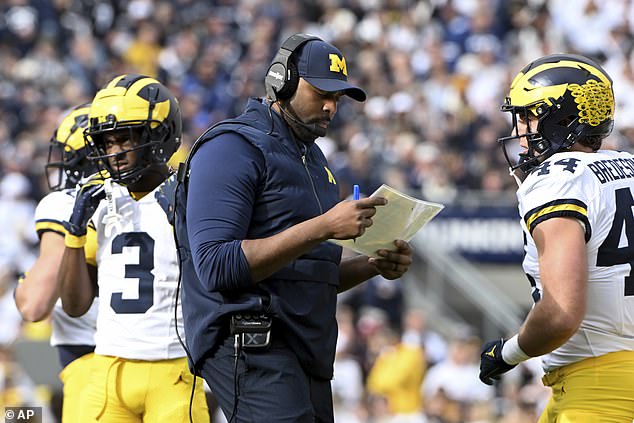 Moore served as Michigan's acting head coach in Harbaugh's absence from the sidelines