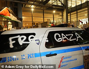 “Free Gaza” was spray-painted on the side of an NYPD car