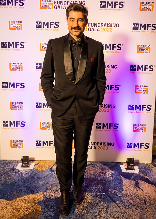 Handsome: And journalist and mental health advocate Matt Johnson looked very suave in a black tuxedo with shiny black lapels and a shiny black bow tie