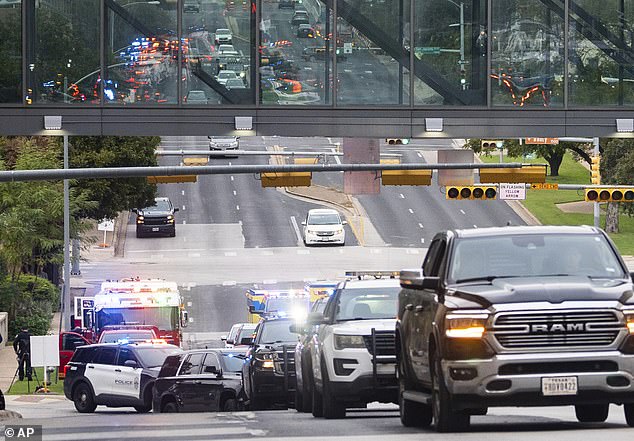 A convoy of emergency vehicles made their way through downtown Austin in tribute to the fallen officer