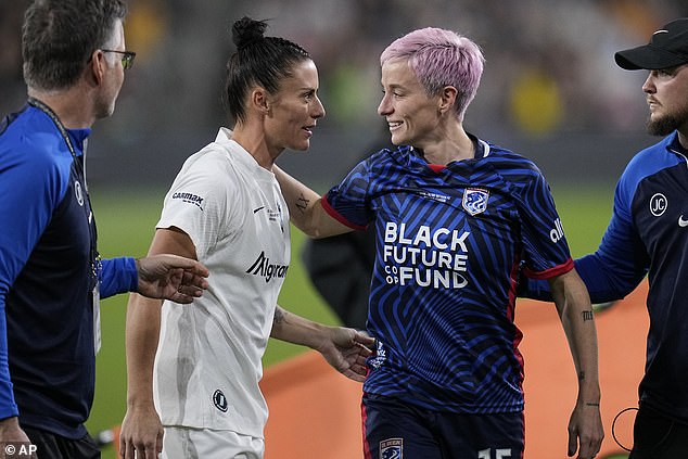 While Rapinoe's career ended in tragedy, her friend Ali Krieger (L) retired with a win