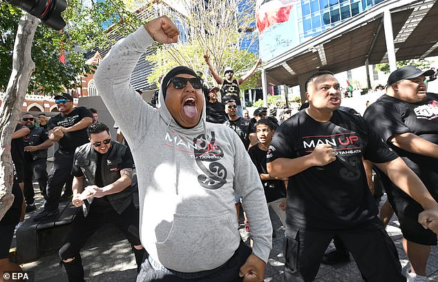 A group of men perform a Haka during a pro-Palestinian demonstration in King George Square in Brisbane, Australia