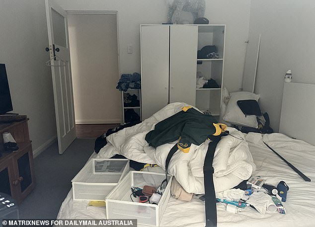 Paul Thijssen's chaotic bedroom in his shared home in Kensington, where he left painkillers, a hockey shirt, sunglasses and a golf club