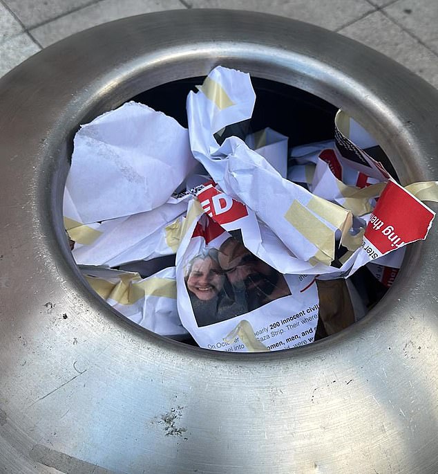 The flyers were found in the campus trash bin after the students fled